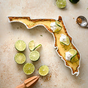 Florida State Plate shown with a dessert, key lime pie. The FL State Plate can be used for food in the oven. Florida dessert dish. Florida pie dish. Florida serving dish. FL ceramic dish. Florida gift. 