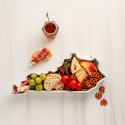 charcuterie board with cheese and cured meats in a Kentucky shaped serving tray platter dish