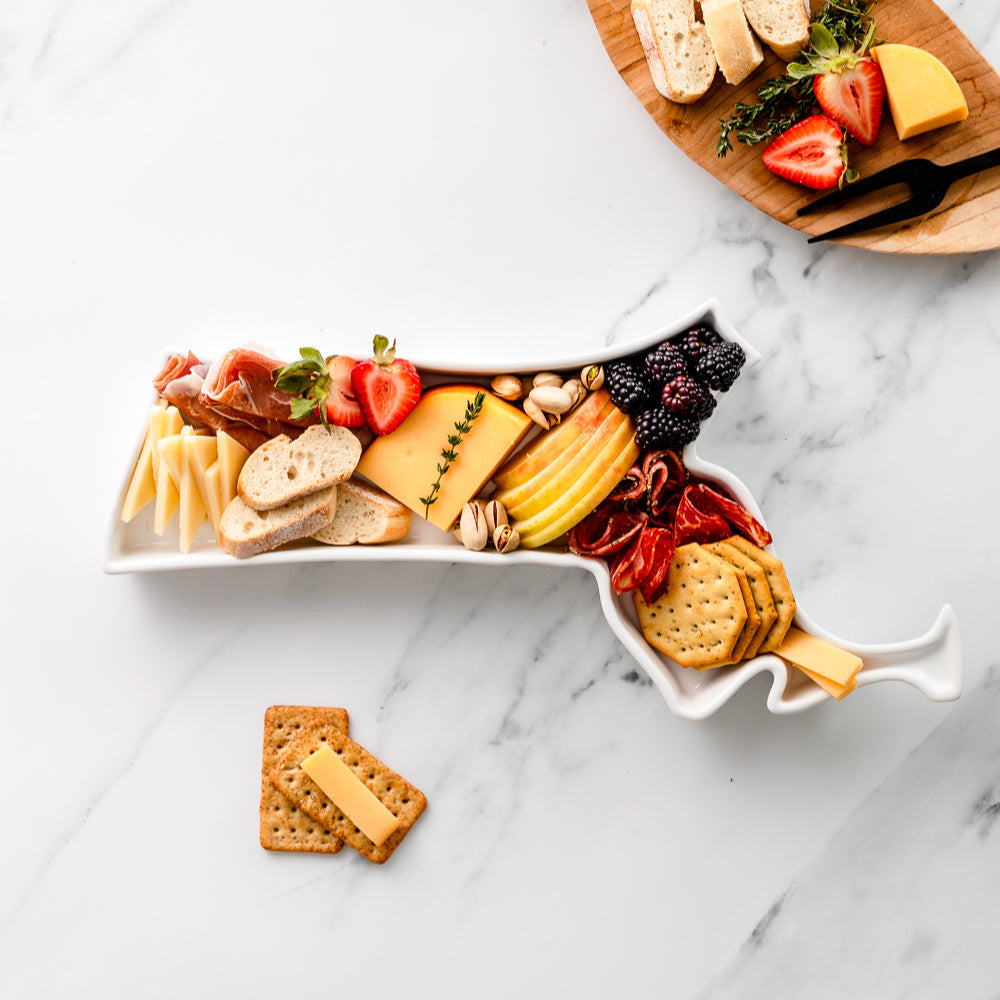charcuterie board with cheese and cured meats in a Massachusetts shaped serving tray platter dish