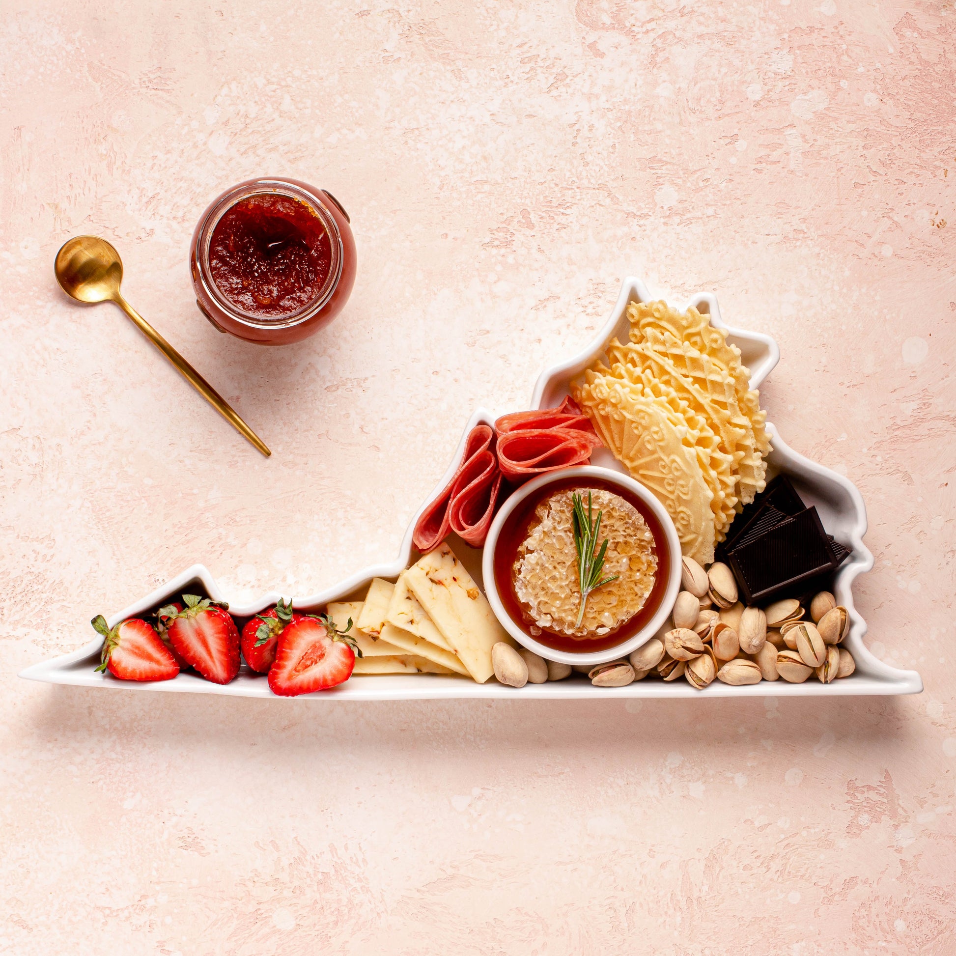 charcuterie board with cheese and cured meats in a Virginia shaped serving tray platter dish